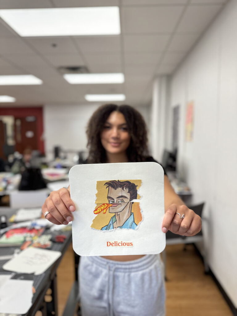 Photograph of a girl holding a collage artwork in front of her