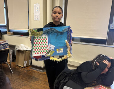 A student showing her mood board.